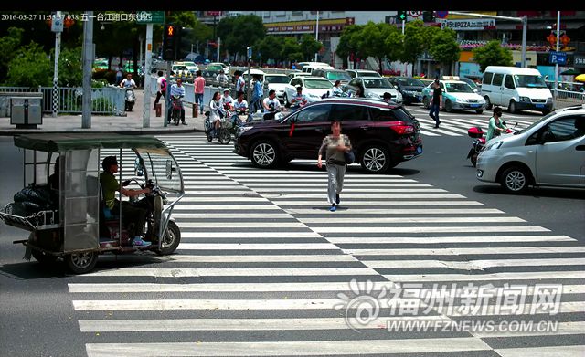 150辆车闯红灯被曝光 抓拍行人和骑车人系统再增一处