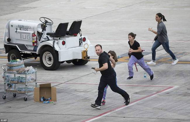 美国机场爆发枪战致5死8伤 乘客跑道上逃命(图)