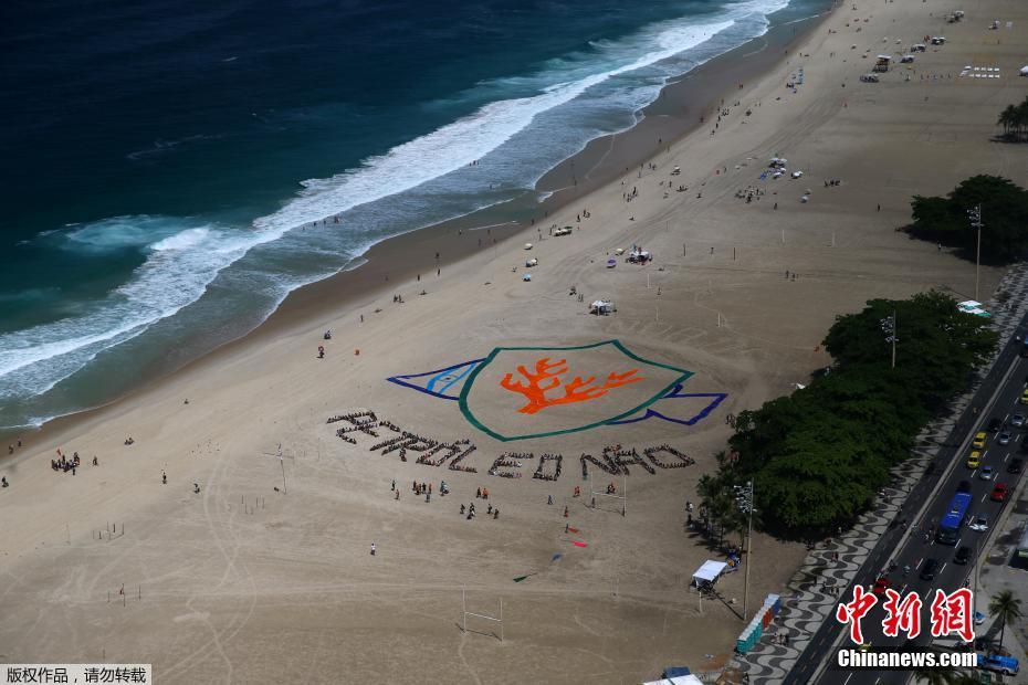 巴西艺术家海滩制巨型标语 呼吁保护珊瑚礁 珊瑚礁被破坏有何影响