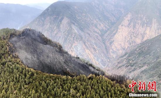 四川木里森林火灾火场已无蔓延危险 确认为雷击火