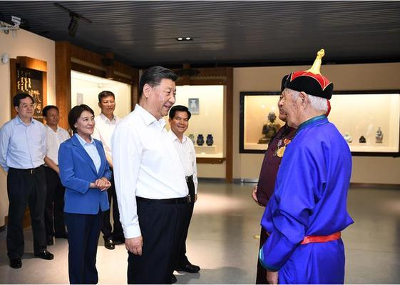 习近平：党中央支持少数民族文化遗产保护
